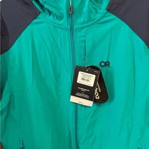 Outdoor Research turquoise and Naval Blue Women's Jacket.